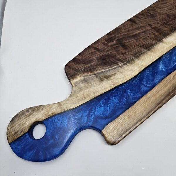 Product image of Long Narrow Walnut and Blue Resin Charcuterie Board with handle