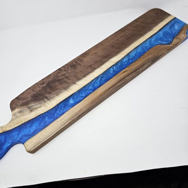 Product image of Long Narrow Walnut and Blue Resin Charcuterie Board with handle